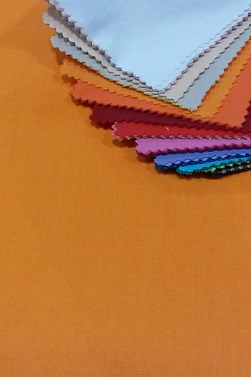 Bombažna tkanina UNI oranžna sveža